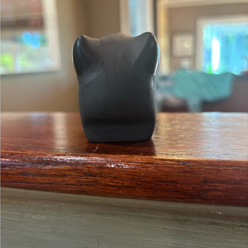 Sleek Black Bear Sculpture